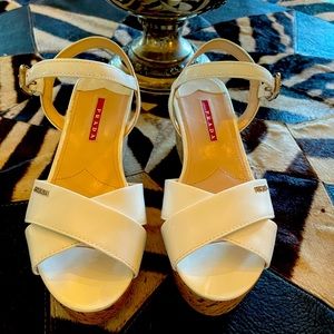 Prada platform sandals with patent and cork.